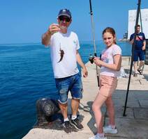 Prva ulovljena riba sa svjetskim prvakom Davidom Pinezićem